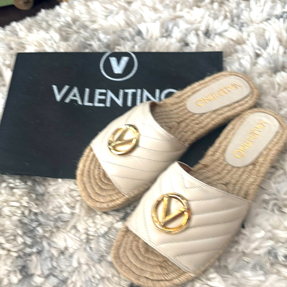 Valentino slides.